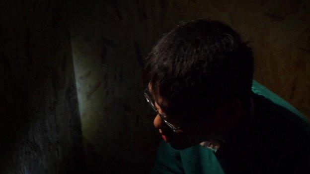 A young actor giving an interview, speaking the words of a Vietnamese boy who was trafficked