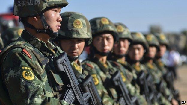 File photo of Chinese Paramilitary policemen taking part in an anti-terrorism exercise involving local police, paramilitary and militia forces, in China's Xinjiang