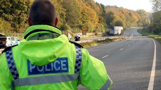 Police officer on the A417 following a fatal crash