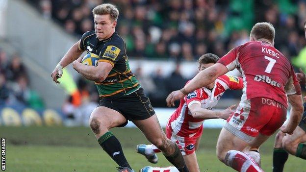 Tom Stephenson of Northampton breaks clear to score a try during the Aviva Premiership match between Northampton Saints and Gloucester at Franklin's Gardens