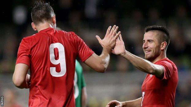 Filip Dordevic celebrates his Serbia winner with team-mate Zoran Tosic