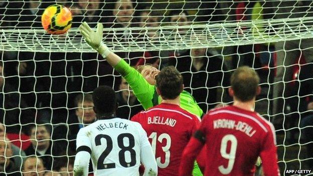 Ball flies past the Denmark goalie