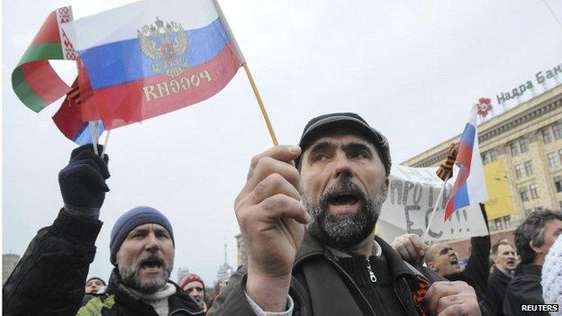 Pro-Russian demonstrators take part in a rally in front of regional government building in Ukraine's second city of Kharkiv