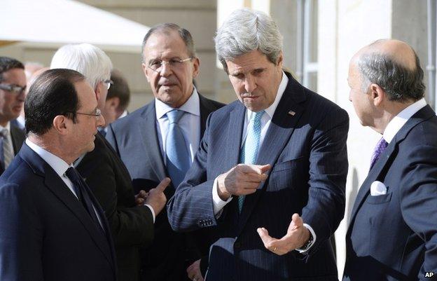 Russia's Sergei Lavrov (back) with John Kerry, Laurent Fabius (R) and Laurent Fabius (L)