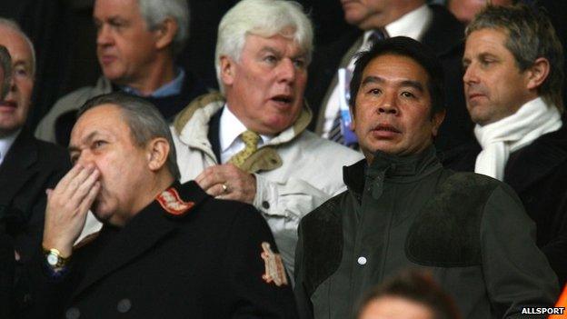 Carson Yeung looks on alongside David Sullivan (L) from the director"s box during the Barclays Premier League match between Birmingham City and Wigan Athletic at St. Andrew"s Stadium on 27/10/07 in Birmingham