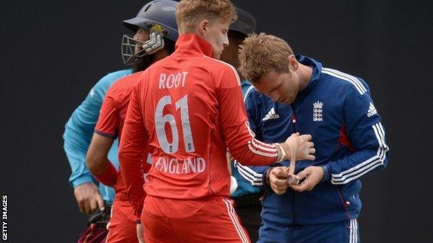 Joe Root has his damaged thumb attended to