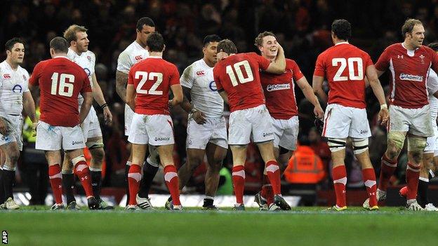 Wales players celebrate after last year's 30-3 victory against England in Cardiff