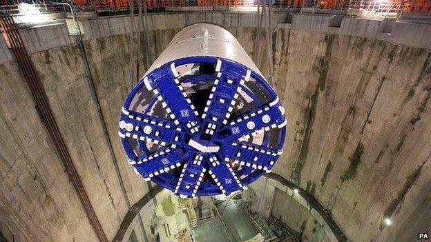 Tunnelling machine named Elizabeth being lowered into the main shaft of the Crossrail project