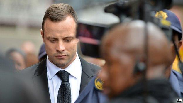 Oscar Pistorius arrives at the court in Pretoria for the third day of his trial