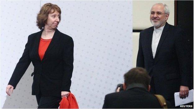 Catherine Ashton and Iranian Foreign Minister Mohammad Javad Zarif arrive for a press statement after a conference in Vienna on 20 February 2014.