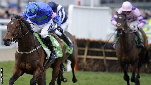 Ruby Walsh riding Hurricane Fly clear the last to win The Stan James Champion Hurdle Challenge Trophy during Champion Day at Cheltenham racecourse last year