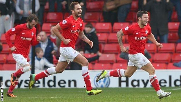 Dale Jennings celebrates scoring for Barnsley against Nottingham Forest