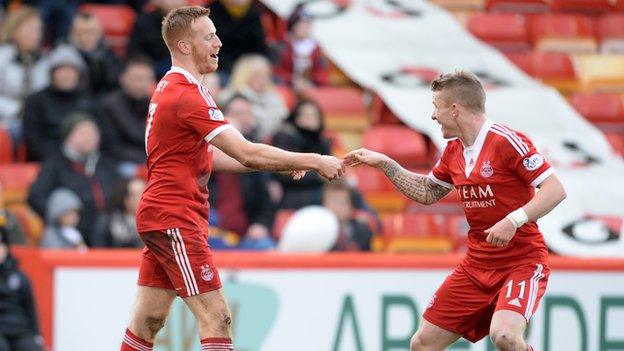 Adam Rooney (left) celebrates his goal with Jonny Hayes as Aberdeen defeat Dumbarton 1-0.