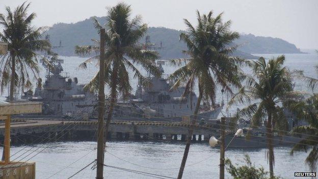 A military search and rescue ship is seen before departing to search for Malaysia Airlines flight MH370, at a port in Vietnam's Phu Quoc island on 9 March 2014