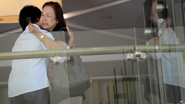 Family members of passengers at a hotel in Putrajaya, Malaysia, 9 March