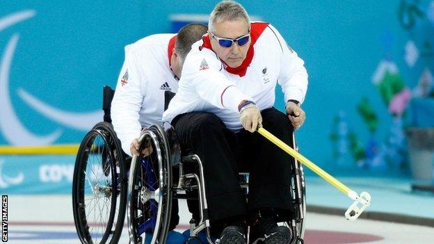 GB curler Jim Gault delivers a stone