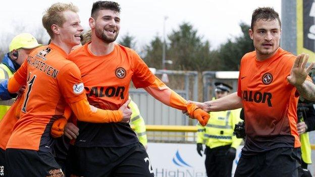 Nadir Ciftci (centre) celebrates Dundee United's second goal against Inverness with Gary Mackay-Steven (left) and Paul Paton (right).