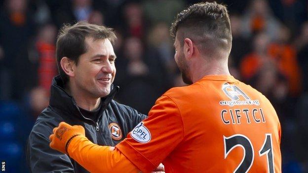 Jackie McNamara congratulates goal-scorer Nadir Ciftci as Dundee United beat Inverness 5-0