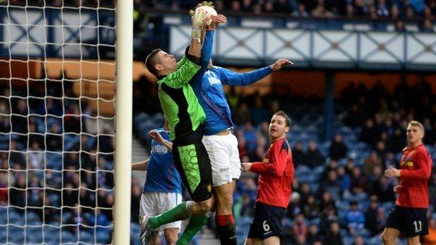 Albion Rovers players felt goalkeeper Neil Parry was fouled by Bilel Mohsni (right) in the lead up to Rangers' equaliser