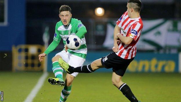 Rovers player Rob Cornwall is challenged by Derry's Michael Duffy