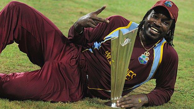 Chris Gayle celebrates with the ICC World Twenty20 trophy in 2012