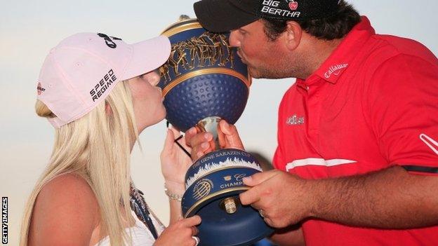 Reed celebrates his victory with wife Justine