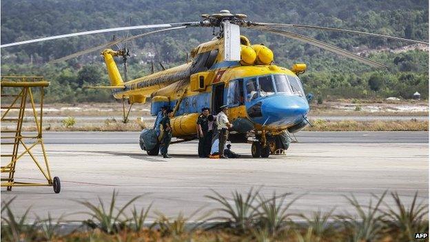 Vietnamese helicopter prepares to join search, Phu Quoc (10 March 2014)