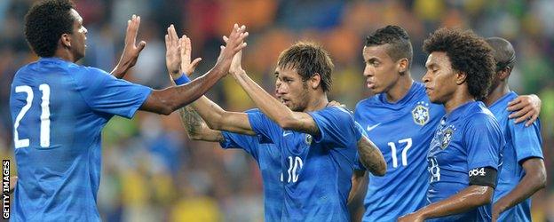 Brazilian striker Neymar celebrates scoring against South Africa