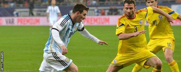 Lionel Messi in action against Romania