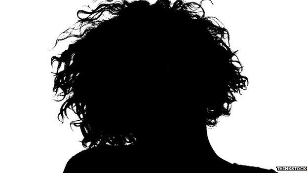 Silhouette of the back of a woman's head