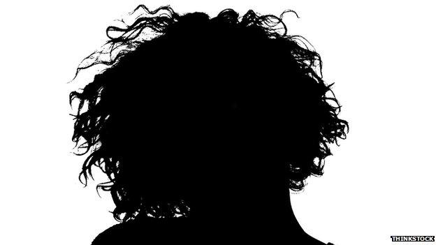 Silhouette of the back of a woman's head