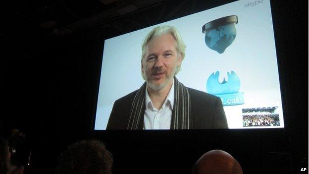 Fugitive Wikileaks founder Julian Assange speaks via Skype at the South By SouthWest Interactive festival in Austin, Texas, on 8 March 2014