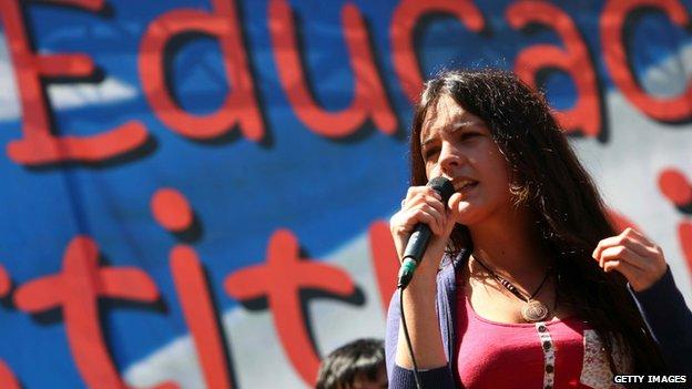 The leader of the student movement of Chile, Camila Vallejo, speaks to the crowd on the second day of a 48-hour demonstration to press the government of President Sebastian Pinera to reform the country's education system in Santiago on 19 October, 2011