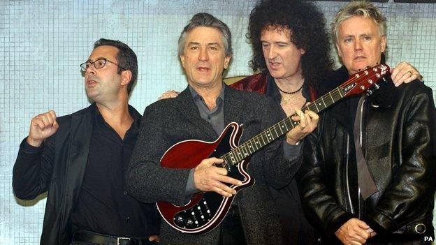 Ben Elton, Robert De Niro, Brian May and Roger Taylor