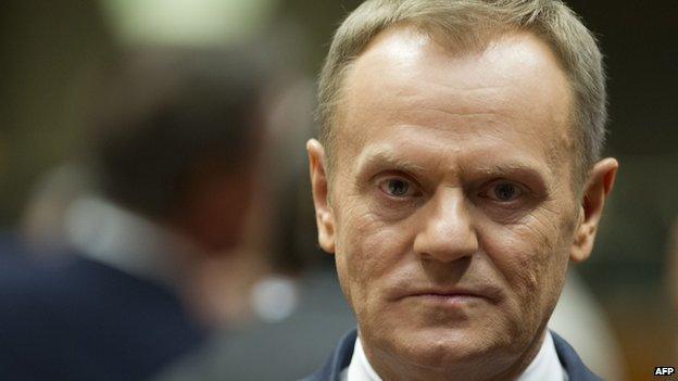 Polish Prime Minister Donald Tusk arrives on March 6, 2014, at the EU headquarters in Brussels, ahead of an emergency summit on the crisis in Ukraine