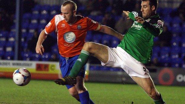 Danny Livesey of Wrexham battles with Braintree's Kenny Davis