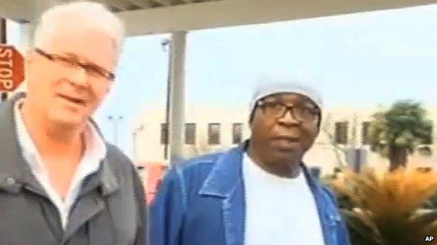 Glenn Ford (right) walks out of a maximum security prison in Louisiana