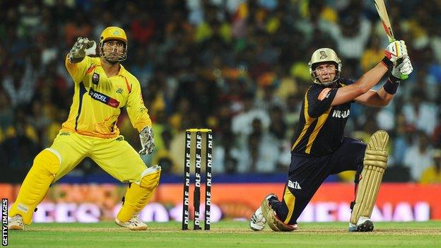 Kolkata Knight Riders batsman Jacques Kallis is watched by Chennai Super Kings captain Mahendra Singh Dhoni