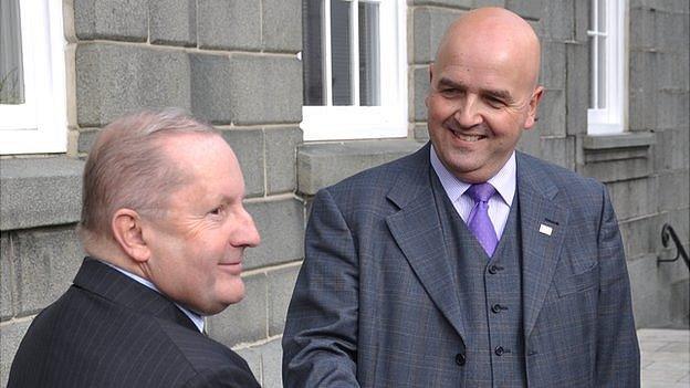 Deputies Allister Langlois (left) and Jonathan Le Tocq shake hands ahead of the vote for the position of Guernsey's chief minister