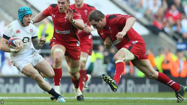 England wing Jack Nowell tries to avoid charging Wales prop Gethin Jenkins