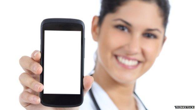 Doctor holding smartphone