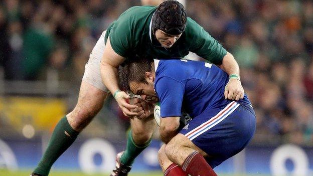 Mike Ross battles with Nicolas Mas in last year's Six Nations clash between Ireland and France