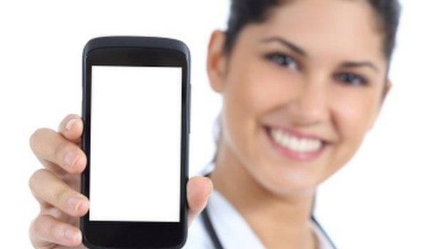 Doctor holding smartphone