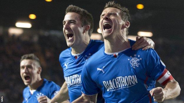 Rangers captain Lee McCulloch celebrates the League One title win