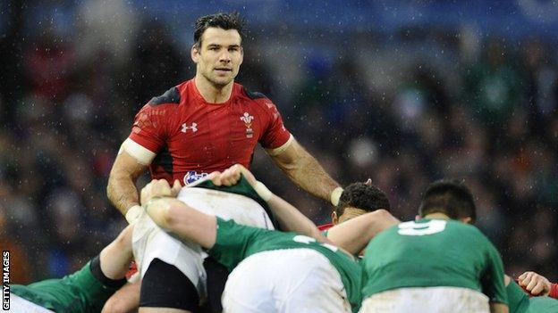 Wales scrum half Mike Phillips looks over the top of the scrum against Ireland