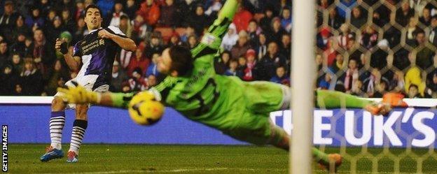 Luis Suarez scores against Stoke