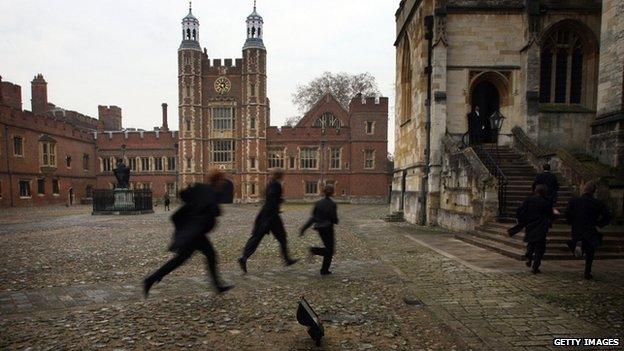 Boys race their way to chapel across the historic cobbled School Yard of Eton College on 17 November 2007