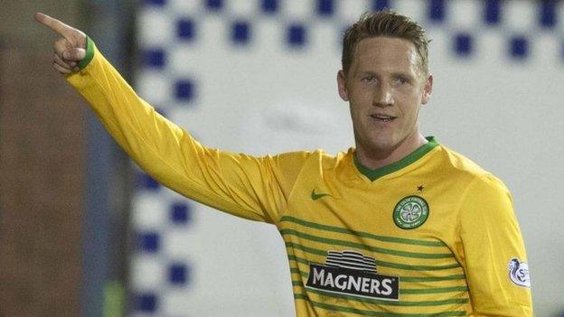 Kris Commons celebrates one of his three goals against Kilmarnock