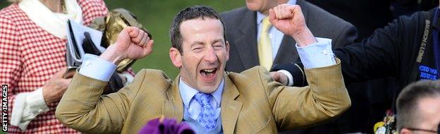 Gold cup winning trainer Jim Culloty celebrates the victory of Lord Windermere during Cheltenham Gold Cup day at the Cheltenham Festival at Cheltenham racecourse.