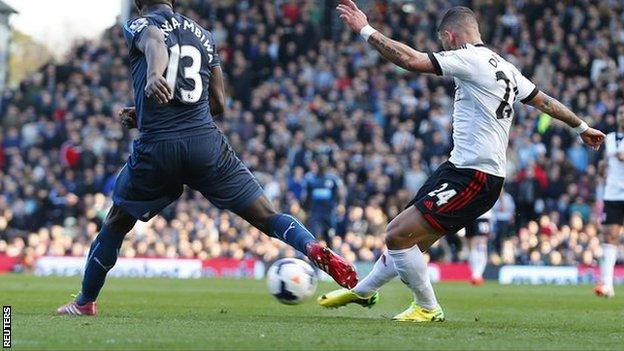 Fulham's Ashkan Dejagah (right) scores the winner against Newcastle